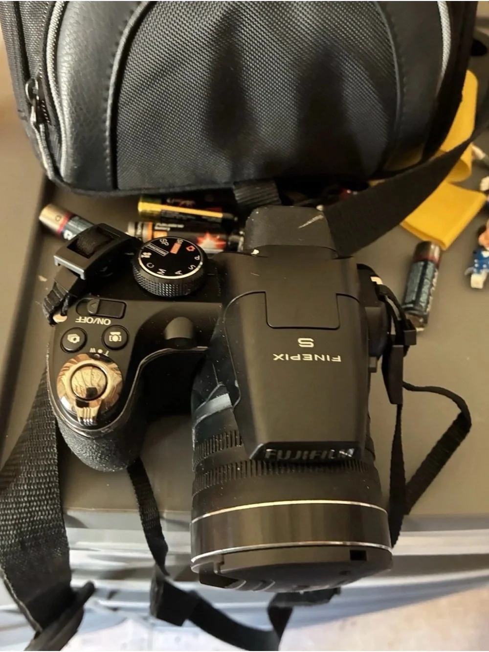Fujifilm FinePix S-series digital camera with travel case